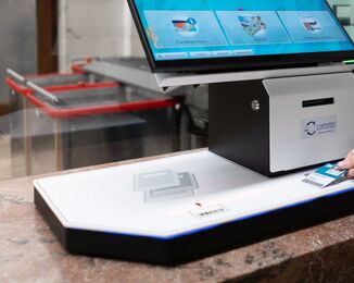 Self-service return machine and selfcheck